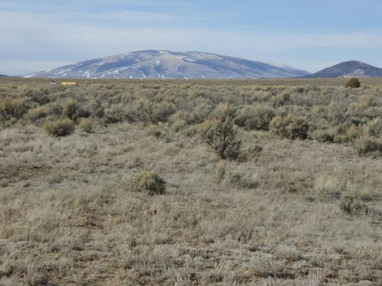 Distant Mountain views. Northern New Mexico West of Taos. 3 adjoining parcels.