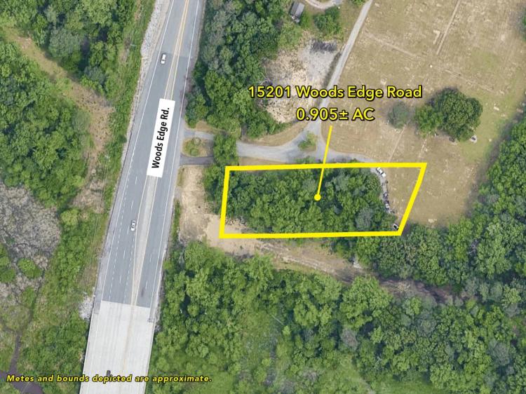 0.91 Acres at 15201 Woods Edge Rd
