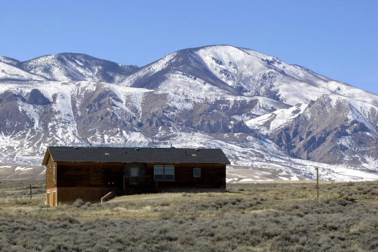 Home on the Range! 21 acres  bordering BLM land with a home on full-unfinished basement!