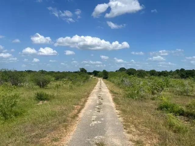 Income-producing property with two operating oil wells