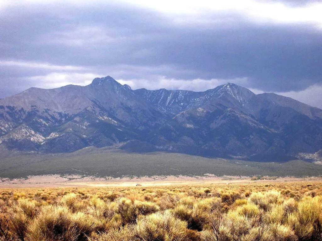 Huge mountain Views from this 5+ acre parcel between Alamosa  & Blanca Colorado with EZ hiway access