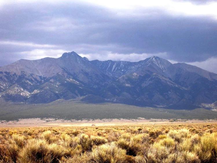 Huge mountain Views from this 5+ acre parcel between Alamosa  & Blanca Colorado with EZ hiway access