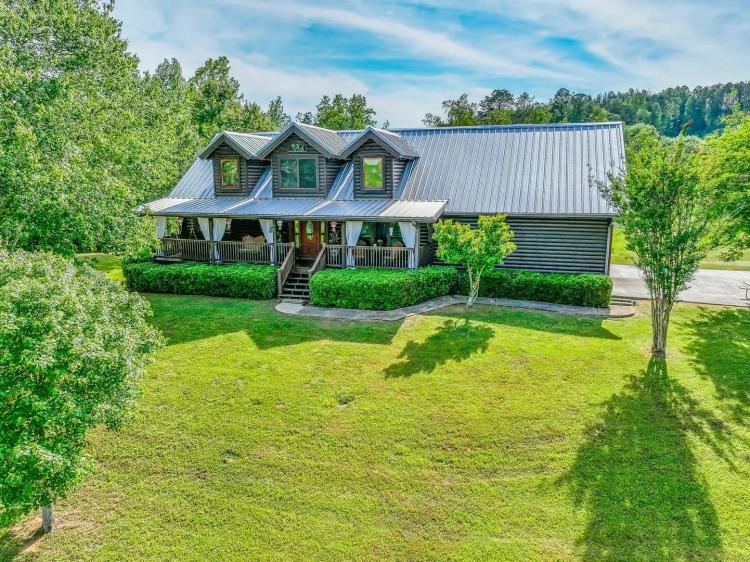 CHARMING 13.84+/- ACRE FARM WITH FRONTAGE ON WEOKA CREEK