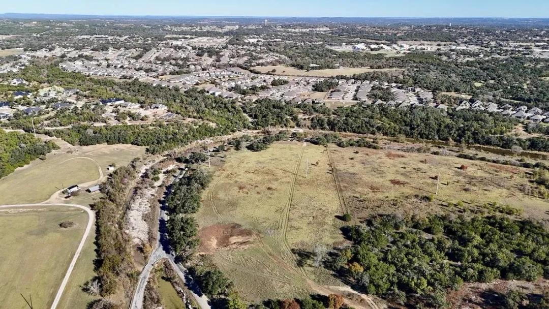 10+ Acres of Creekside Hill Country Living in Dripping Springs