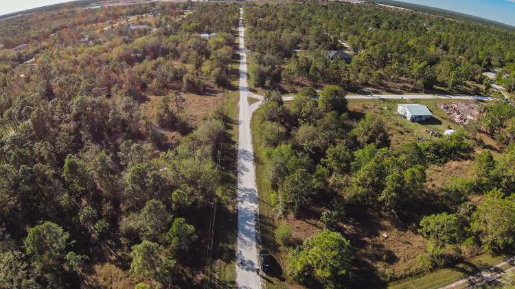 Own this Wooded Lot in Punta Gorda, FL. Easy Build, POWER Available……Close to Everything!