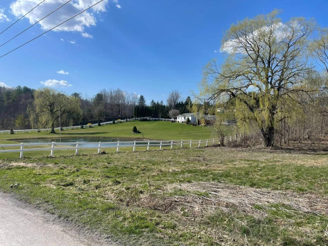 1 cleared acre to build on. Owner has Septic approval paperwork