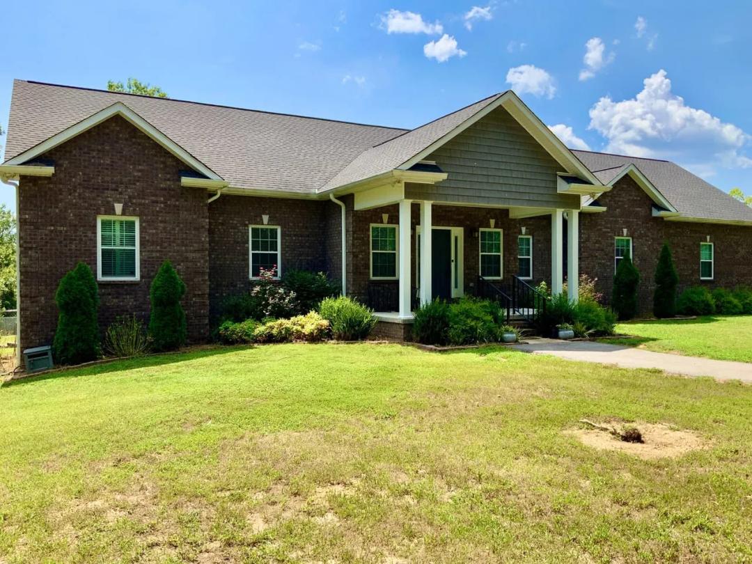 Owner Financing Available! Beautiful Brick Home with Large Morton Shop in Hickman County!