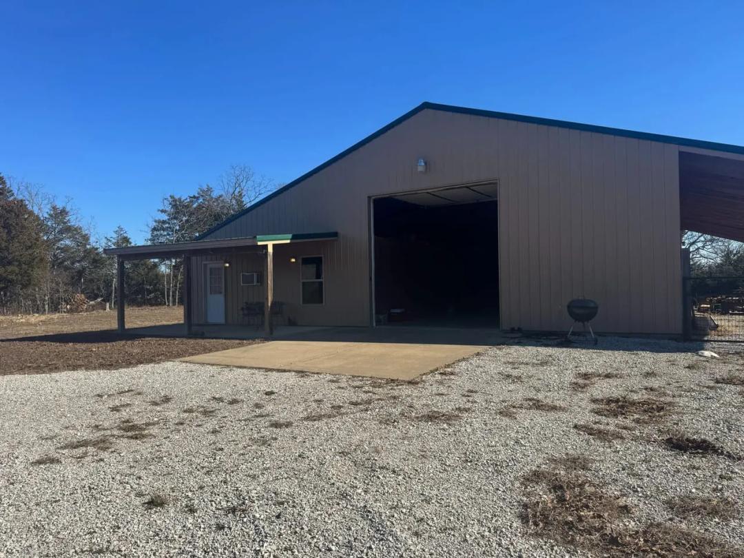 57 Acres and Shop House 1 Minute from Table Rock Lake