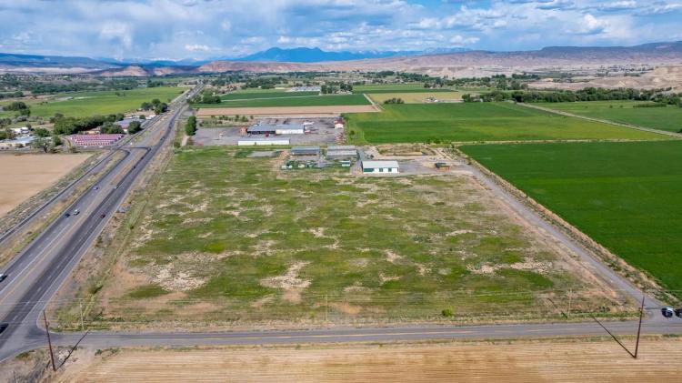 Delta CO industrial building with 25 acres, water rights