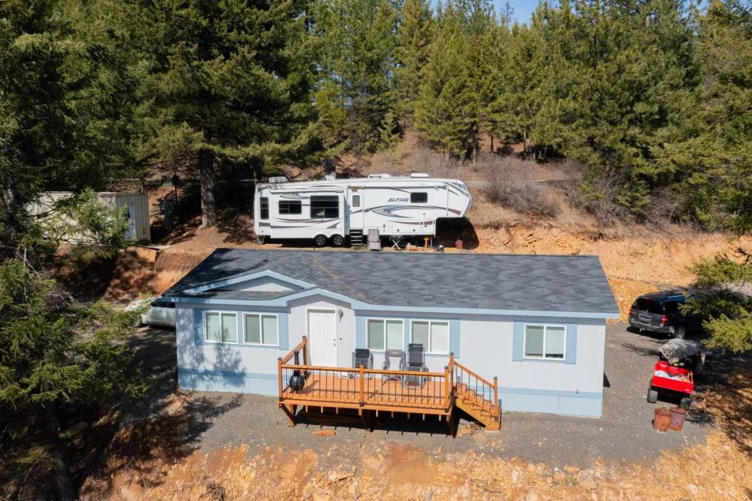 A Private Hillside Escape with Elevated Views & Turnkey North Idaho Living