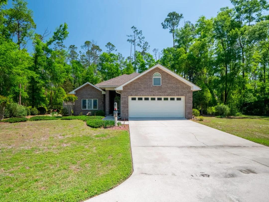 Beautifully Maintained 3-Bedroom, 2-Bath Brick Home Located in Vibrant 55+ Community