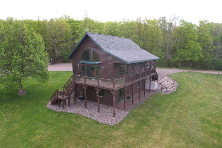 50-Acre Country Home in Butternut, WI for Sale - Serene Retreat with Schaum Creek Frontage!