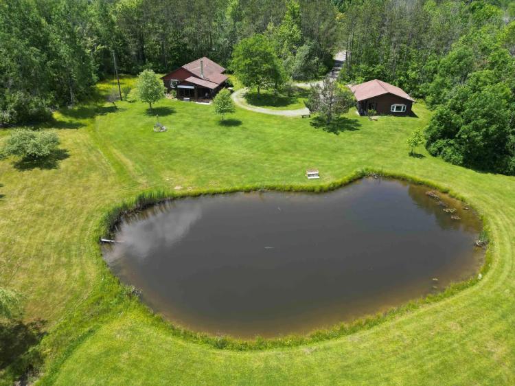 Country Home with Garage and Stocked Pond on 8 acres in Wayland NY 10196 Lander Rd