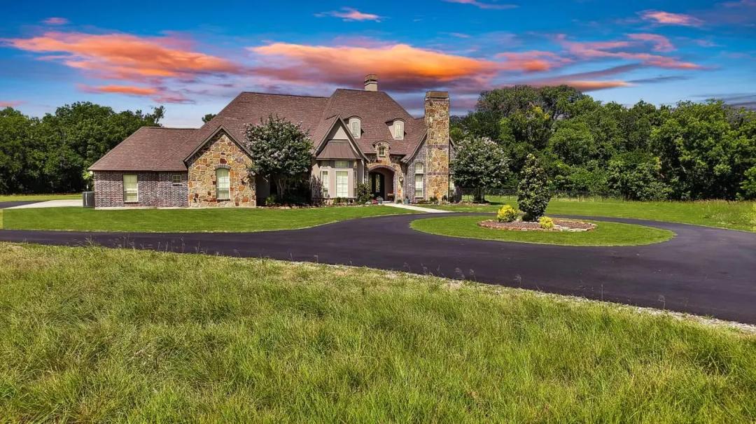 69 Acres with a Custom Home, Shop and Natural Gas