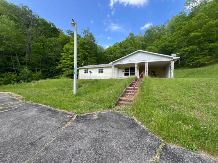 27.40 Acres with Gutted House and Free Gas! Duck, WV!