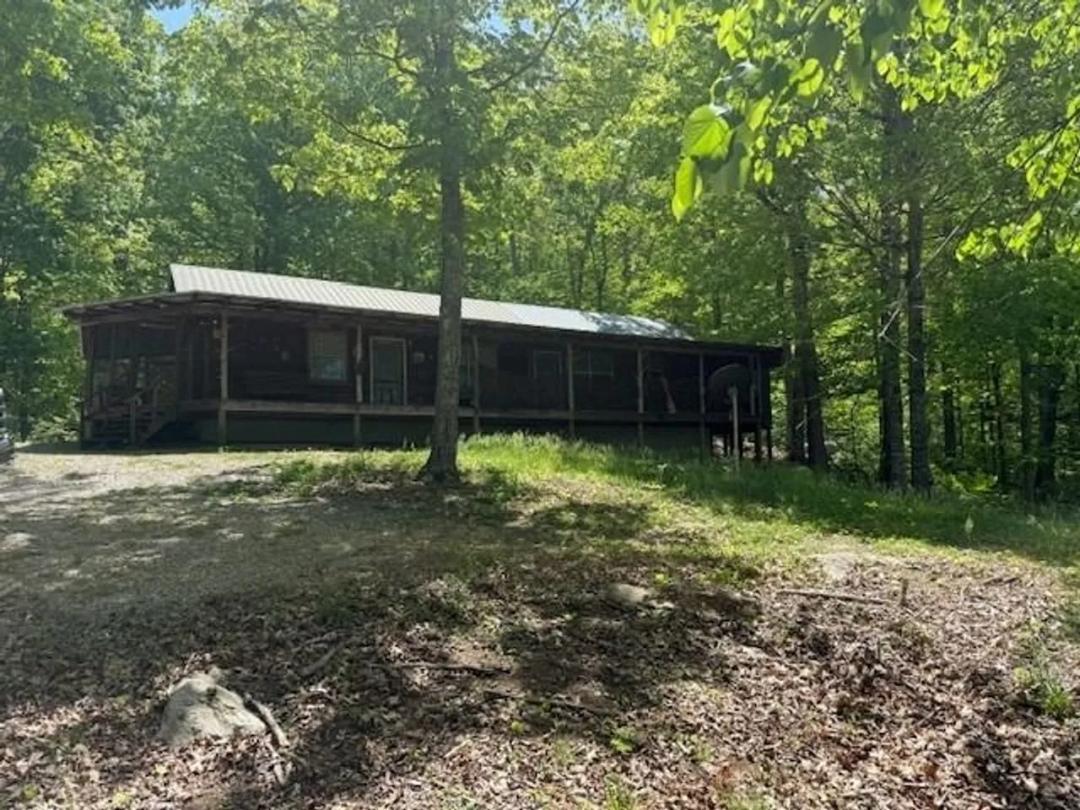  132.84+/-acres, with Rustic Hunting cabin that offers the ultimate private retreat in the mountains of Pikeville TN
