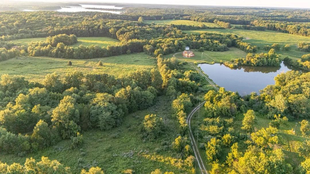 17-Acre Private Escape with Stocked Lake and Custom Home – Monroe County