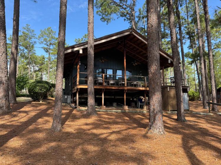 Private Lake with Cabin on 72.45 +/- Acres