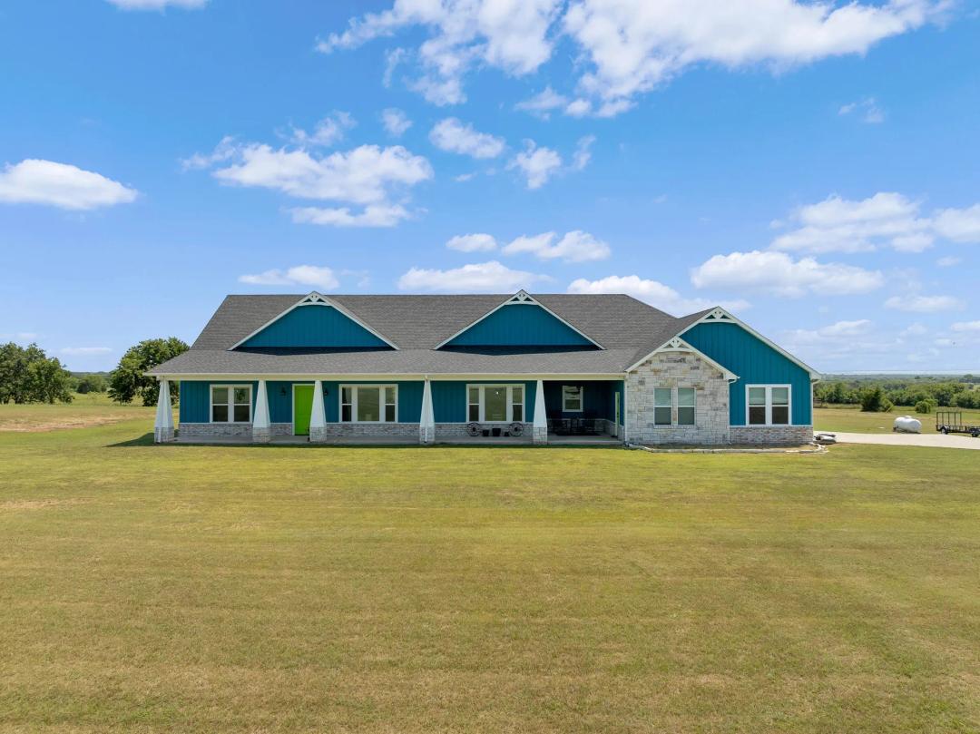 Spanning 3,635 sq ft on 15 acres, this stunning 3-bedroom, 3.5-bath home offers a functional split floorplan with every bedroom featuring its own en-suite bath. The master suite includes a co