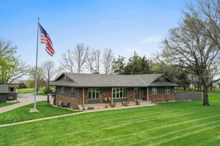 Beautiful property with ample outbuildings on nearly 5 acres!