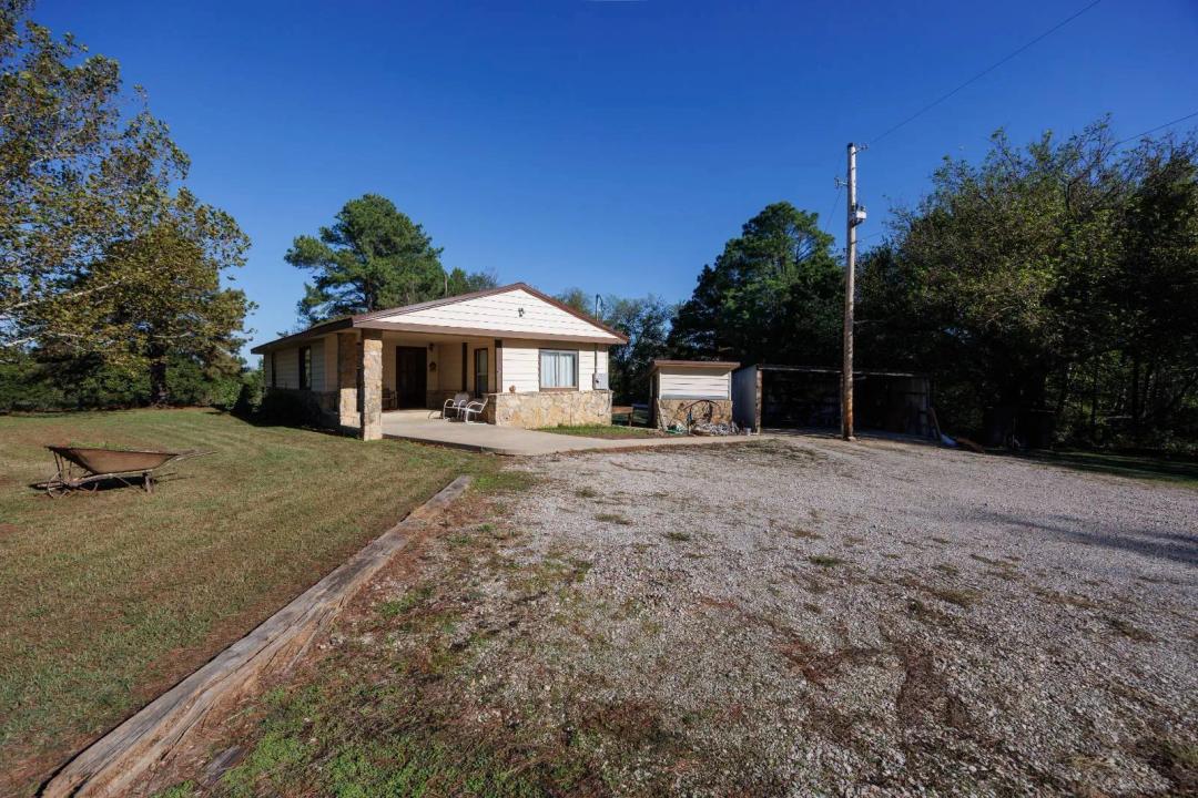 **Private Country Living on 5± Acres with Creek &amp; Mature Pines**