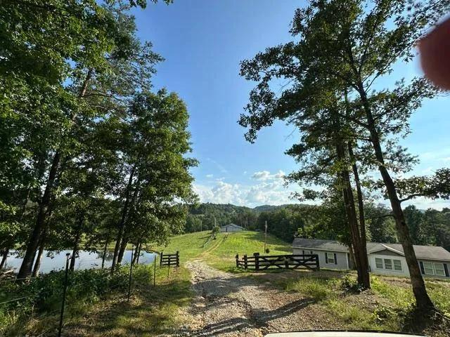 122+/-AC FARM OASIS,SECLUDED NEWER HOME CARTER CO.KY $449,900