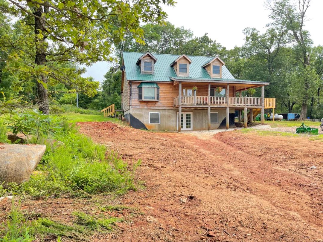 Log Cabin on 67.77 Acres