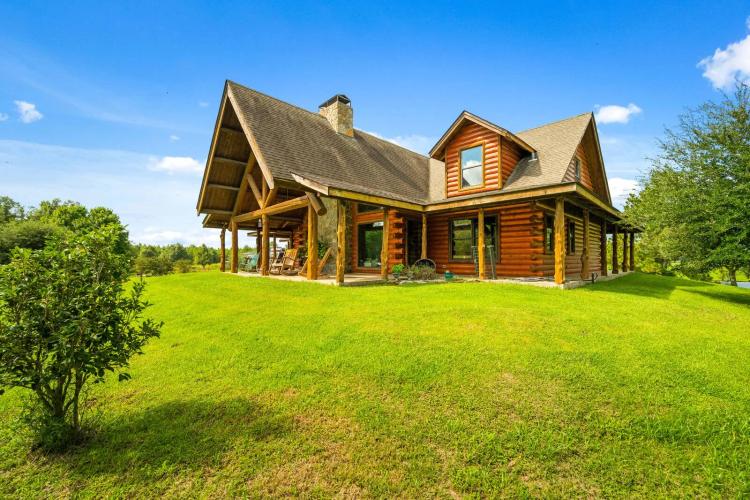 Water front Log Home with pool, horse barn, and shop on 41+/- AC