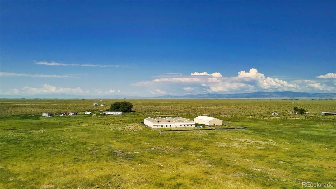 144 Acres/ Home/ High Capacity Adjudicated Water Rights/ 4 Bay Greenhouse - Center Pivot 