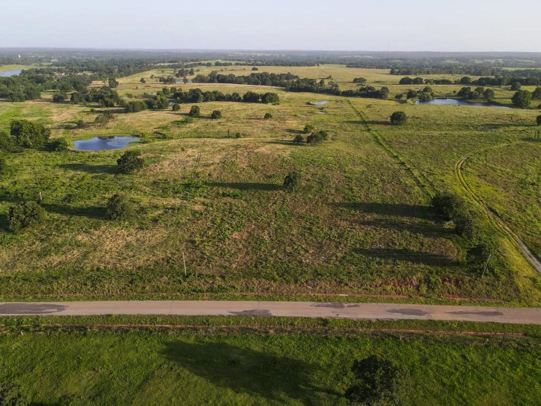24+/- acres w/ blacktop frontage just outside Wellston