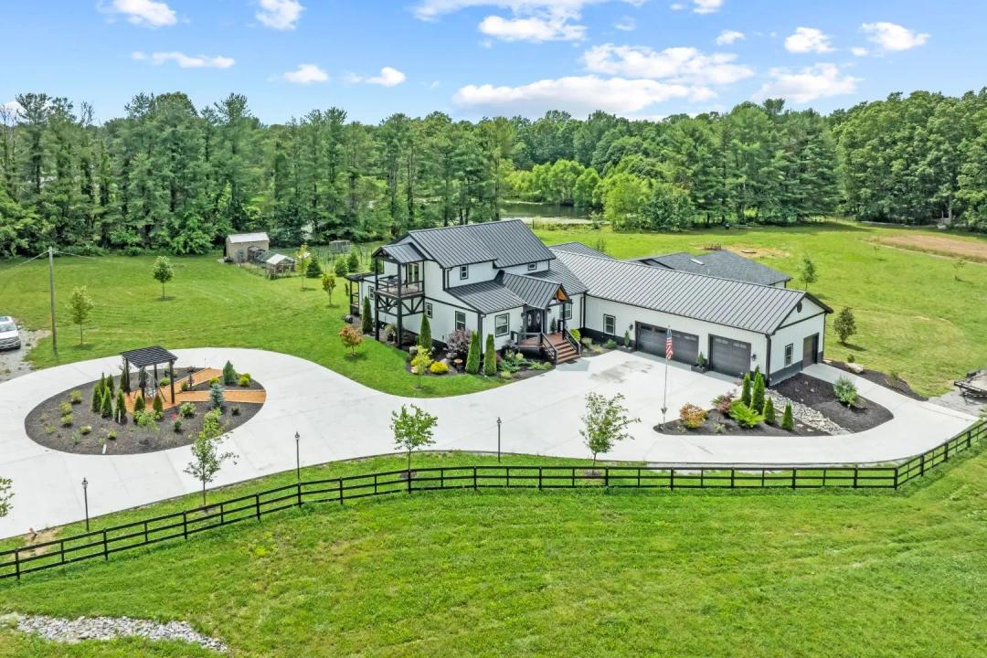 5.75 +/- AC WITH A CUSTOM HOME AND LANDSCAPING – TOTALLY OPEN LEVEL GROUNDS