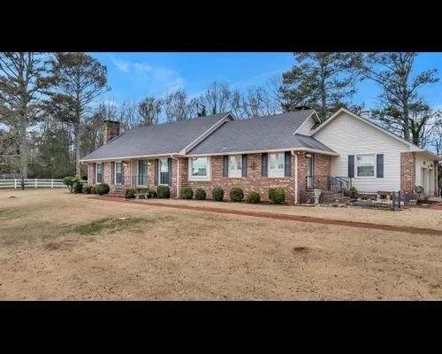 Four-Bedroom Home and Fenced Acreage