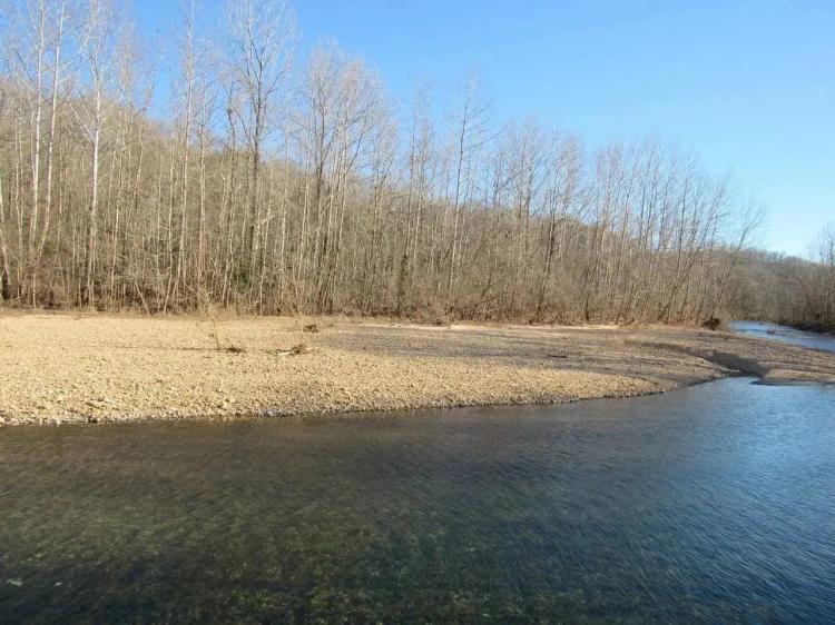 194 acres, James Spring (4 Million Gallons a day) AND Dry Creek!