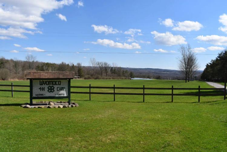 Developed Camp with Pond, Stream, Multiple Outbuildings &amp; Barn