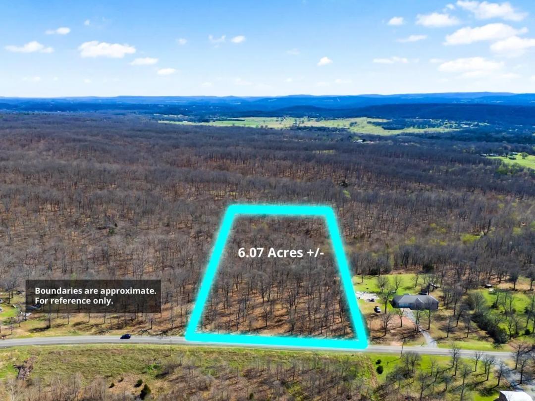 Minutes from Lake Tenkiller, over 6 wooded acres off S Qualls Road in Park Hill, Cherokee County