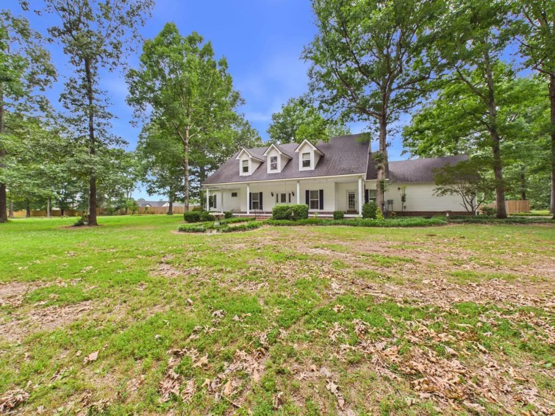 Stunning Custom Farmhouse on 2.15 +/- Acres | Barn, Shop, Front and Porch & Magazine-Worthy Charm