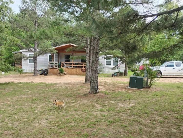 BEAUTIFUL MFD HOME ON 2.5 WOODED ACRES
