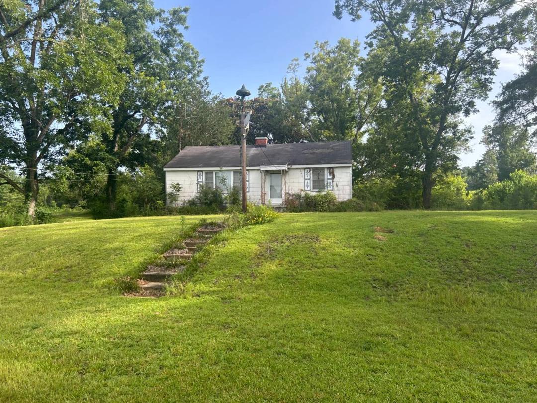 52 acres with 2 homes and pond.