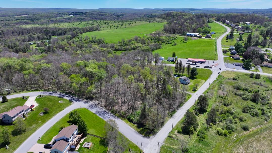 Prime wooded Corner Lot Ready for Your New Home