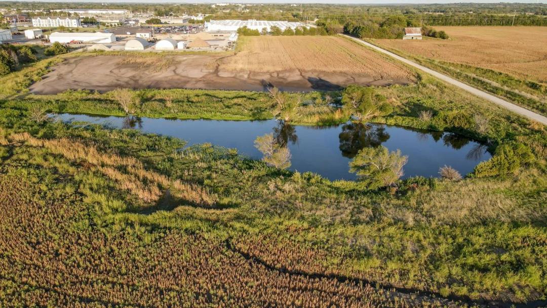 5.96 Acres Adjacent to Independence, KS Walmart with Development