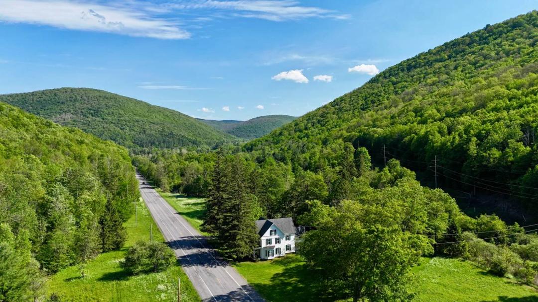 172.1 +/- acres Mountain Homestead, with Farmhouse &amp; Creek