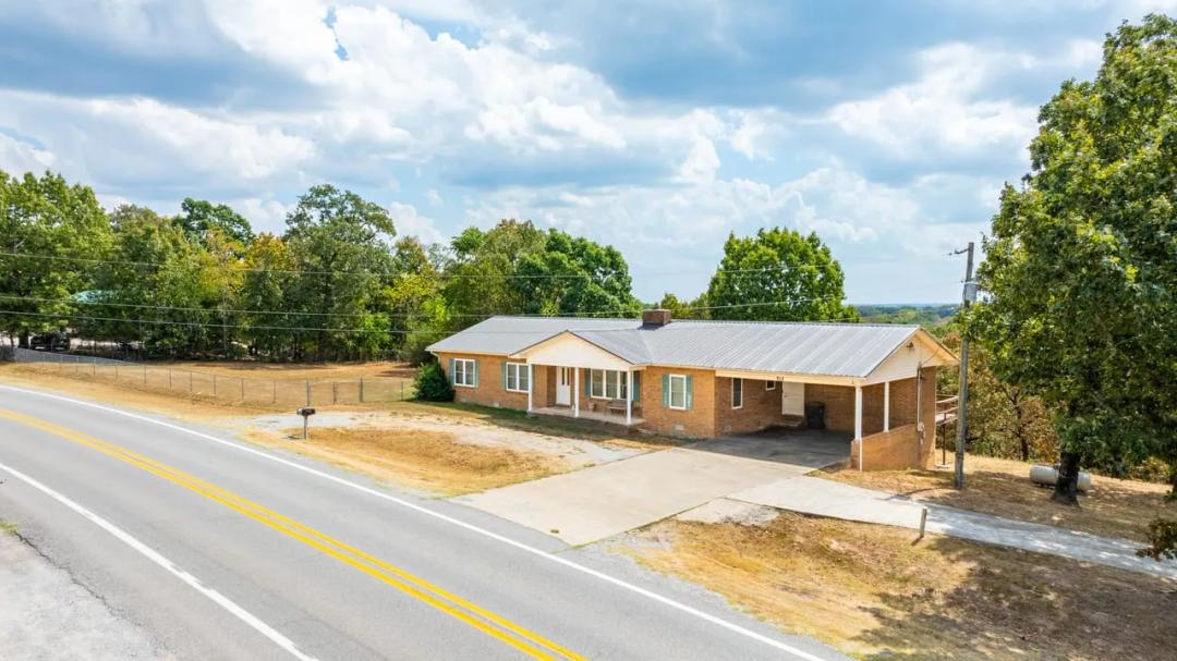 Updated Cave City, Arkansas Home on 8 +/- Acres | Shop, Hwy 115 Frontage & Two-Sided Fireplace
