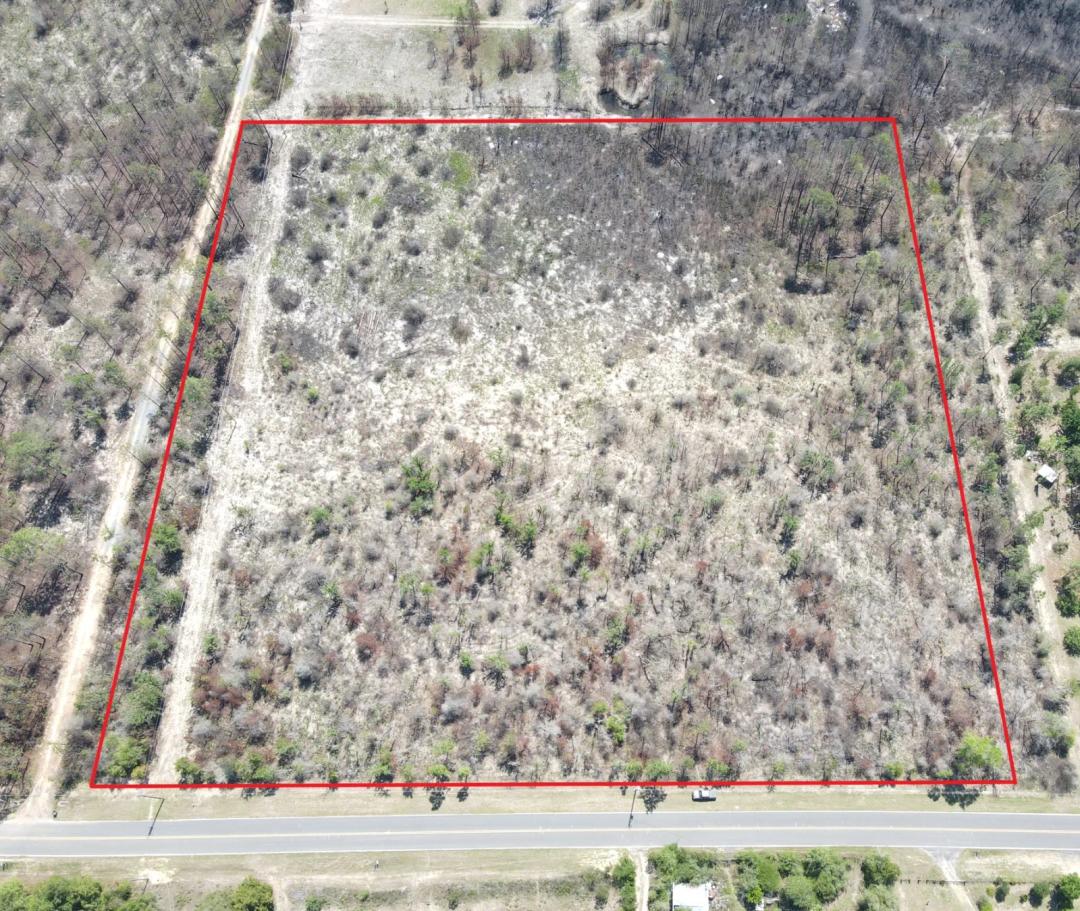 10 acres on a paved road!