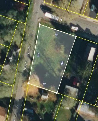 Spacious builder ready corner lot in Bellevue neighborhood.