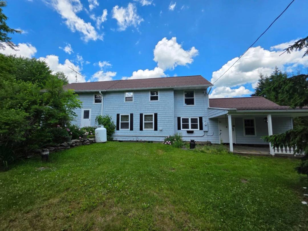 Private 43 Acres with Country home and attached garage.