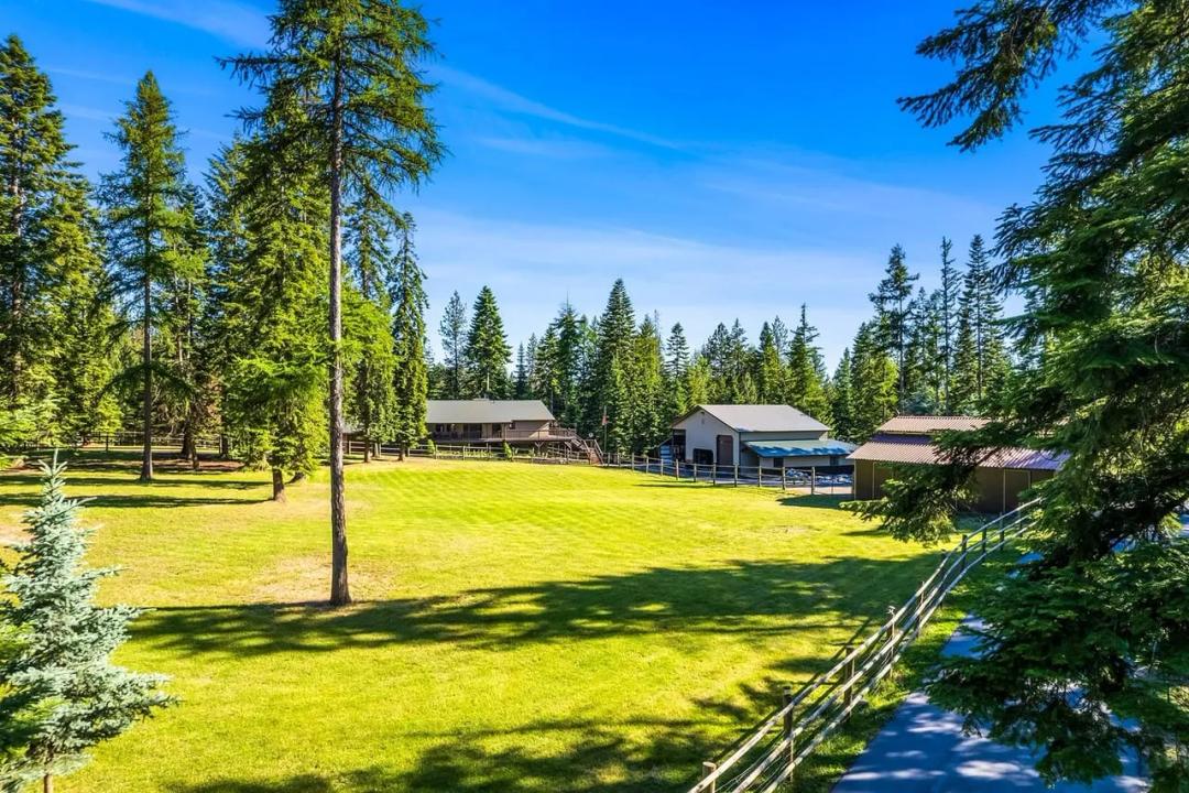Separate Living Quarters + Barn + 86'x68' Shop in Hayden!