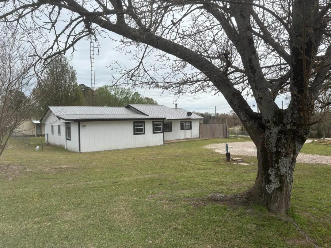 Country Home on 7.6 Acres | Pond, Shop, Water Wells & Hobby Farm Potential