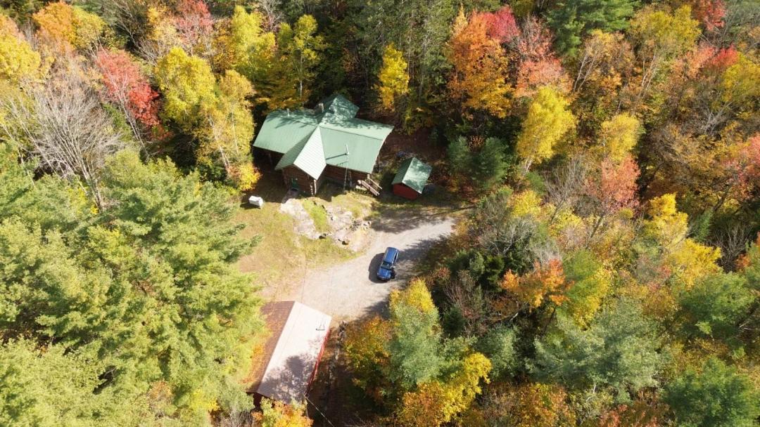Handcrafted Adirondack Log Home on 19.5 Acres of Pristine Forest
