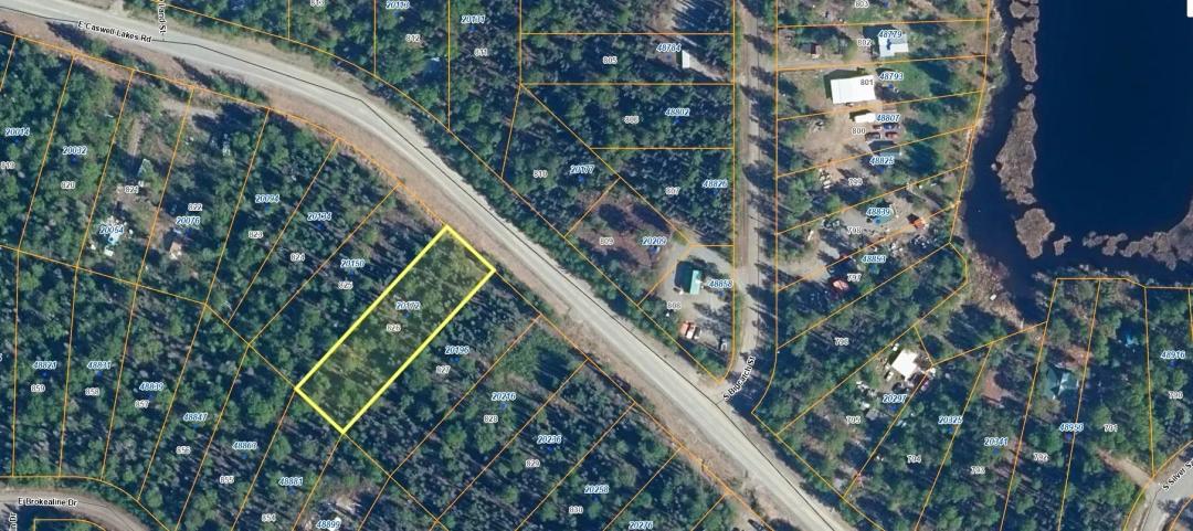 Nearly 3/4 Acre Lot on Caswell Lakes Road - Power - Developed Area by Lakes
