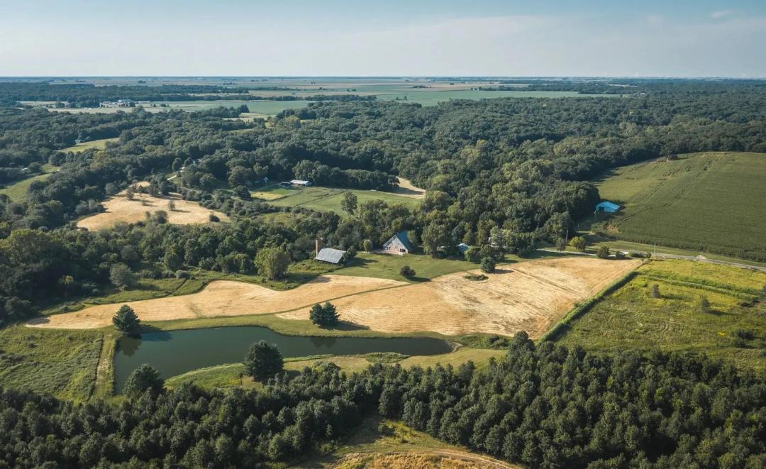 Country Retreat on 30± Acres with Updated Home, Barns, & Pond – McDonough County 